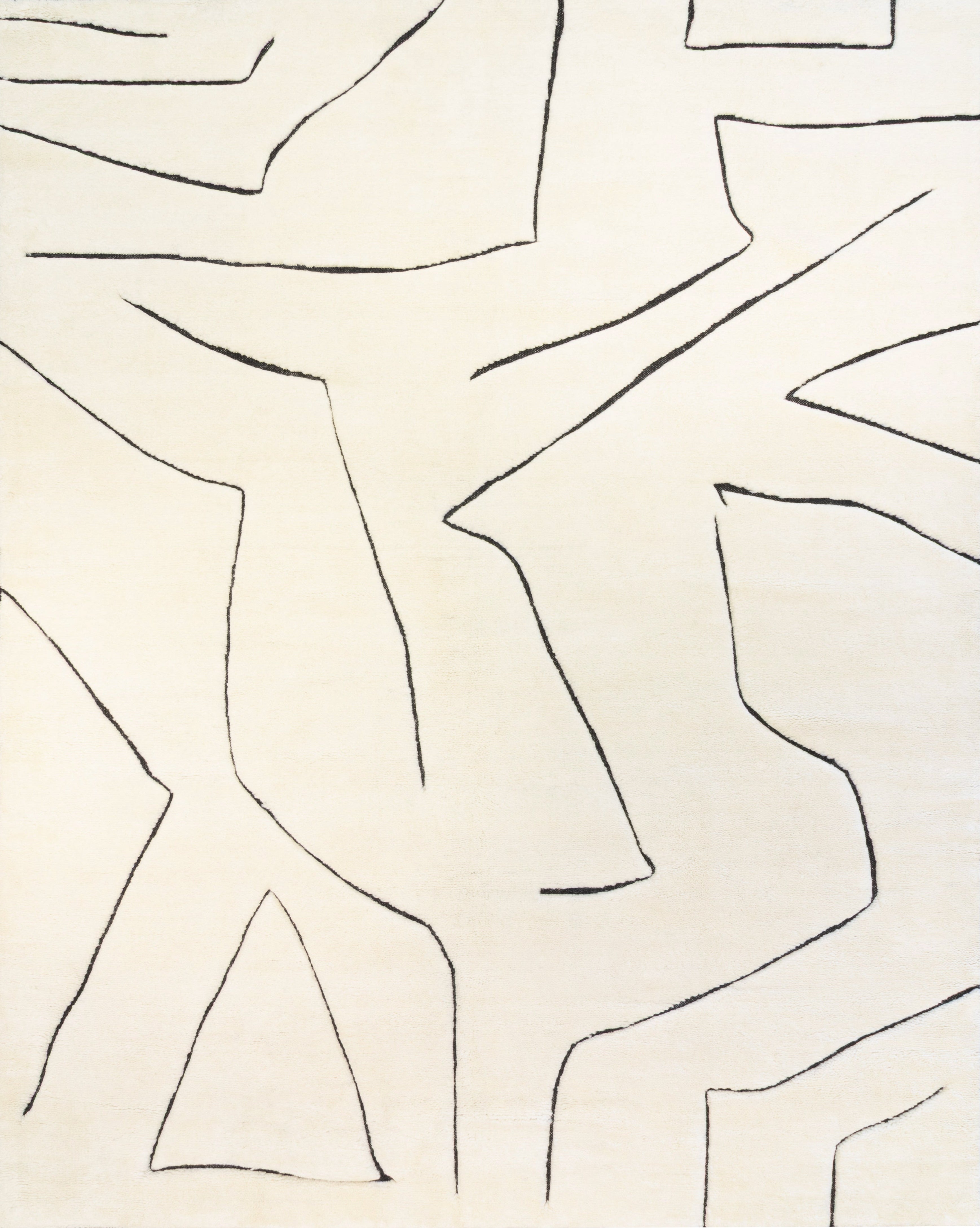 Ivory modern hand knotted New Zealand wool rug with abstract black line design in a minimalist interior setting