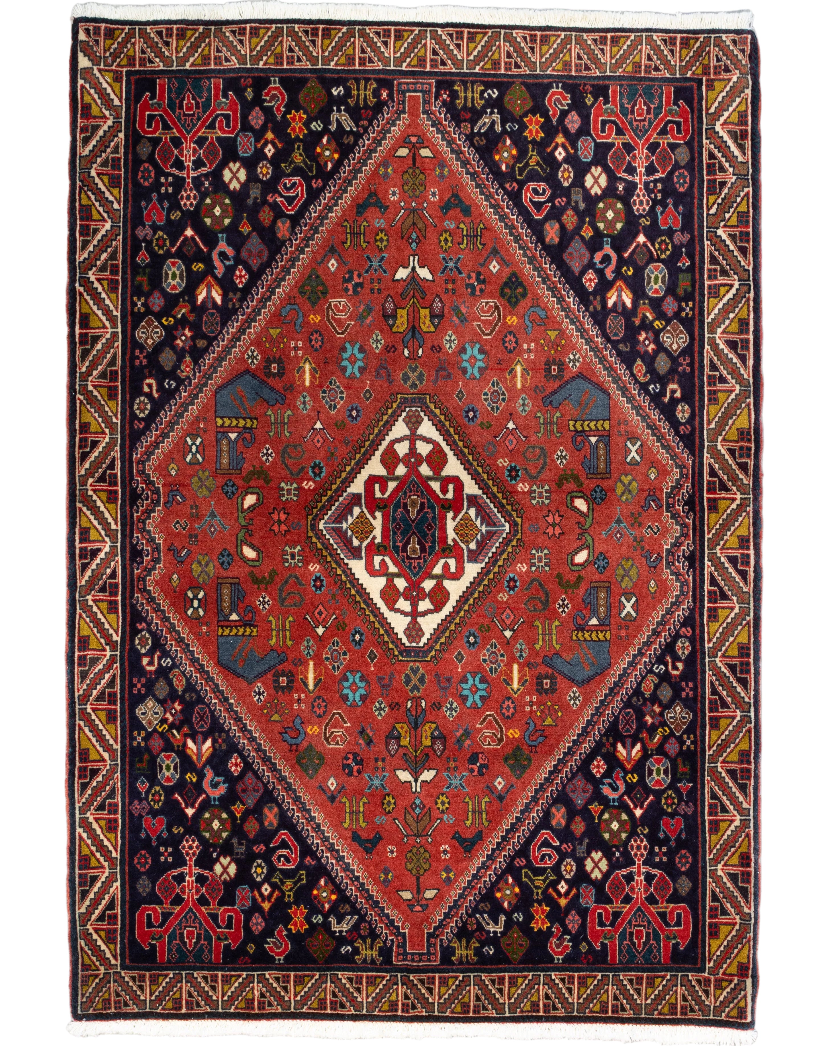 Hand-knotted Persian Qashqai wool rug in brick red with a layered ivory and navy diamond medallion, scattered tribal animal and geometric motifs, and a gold chevron border, 3'6" x 5', made in Iran.