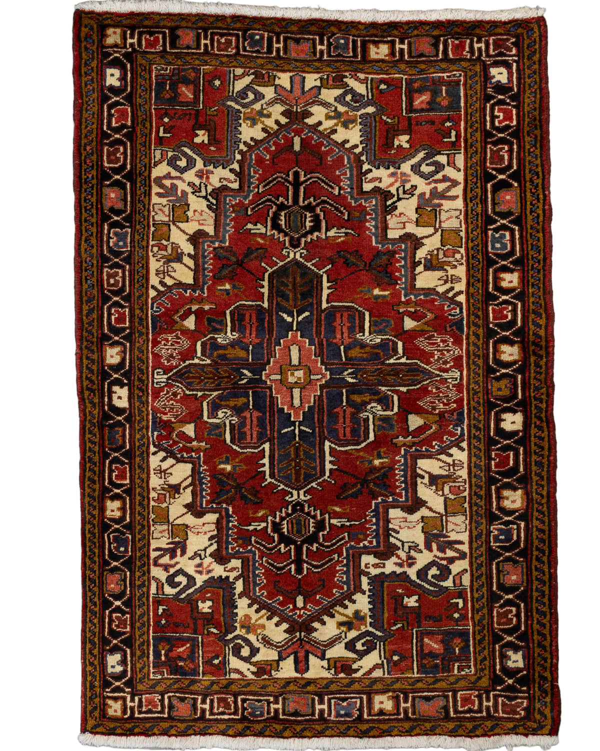 One-of-a-kind 3'4" x 5' Persian Heriz hand-knotted wool rug featuring a brick red geometric central medallion with a navy blue cross-shaped center, ivory corner fields, and intricate angular botanical motifs framed by traditional geometric borders in rust, gold, and brown.