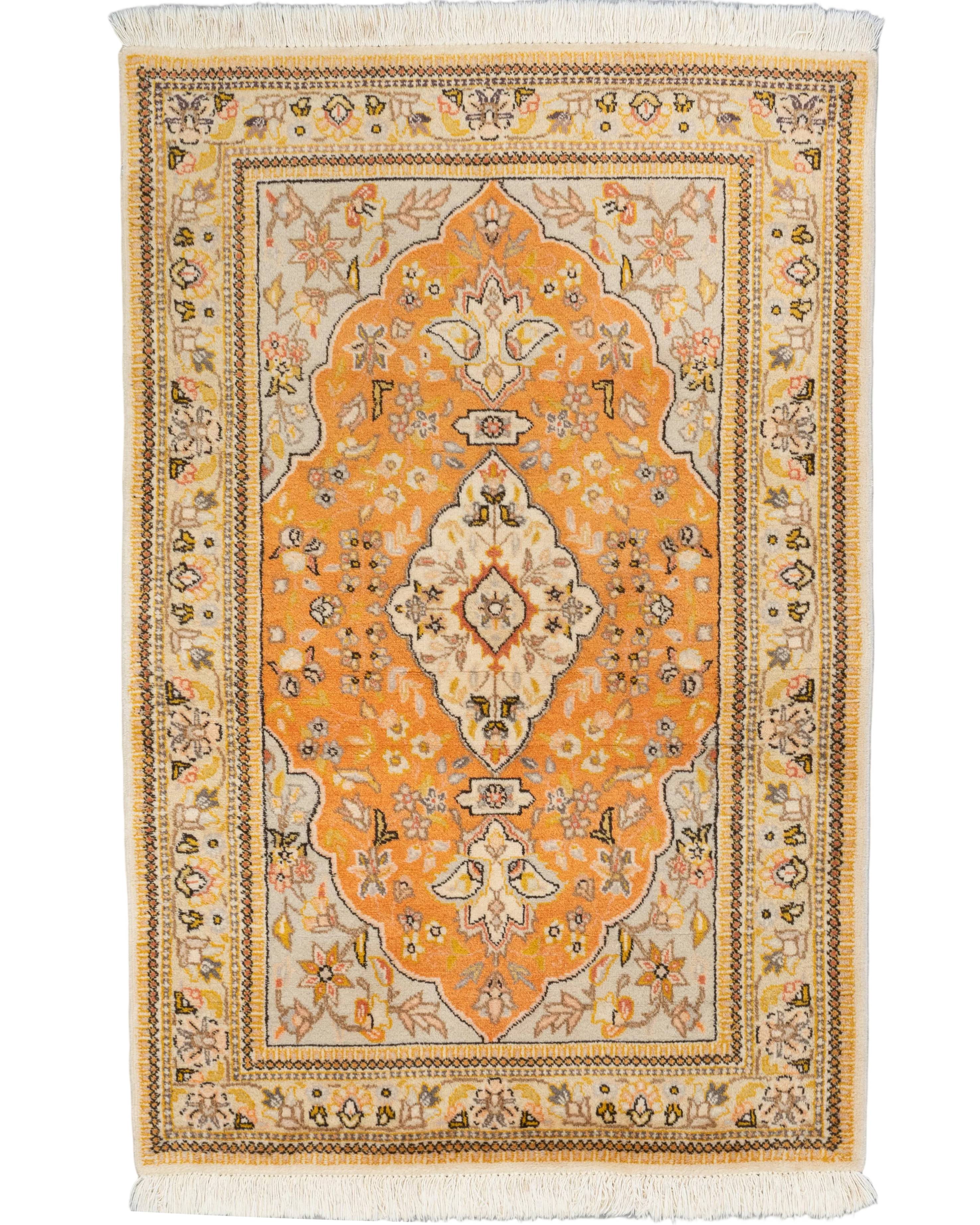 Saffron orange hand-knotted Persian Tabriz wool rug with ivory scalloped medallion, 3' x 5'.