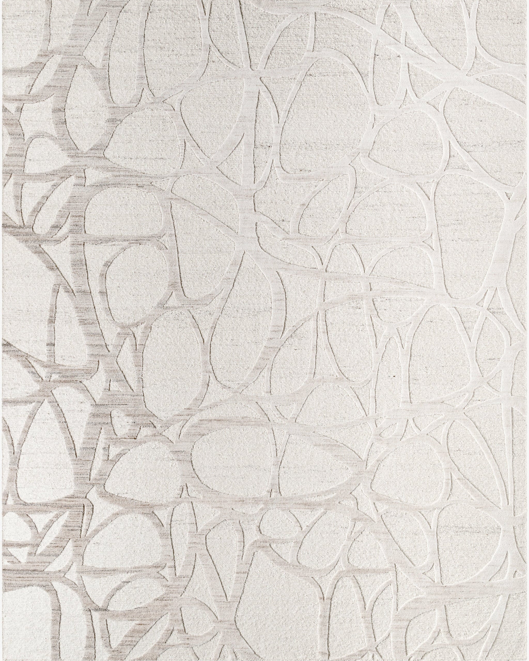 Hand-knotted ivory wool and bamboo silk rug with tonal branch linework pattern, multiple sizes available.