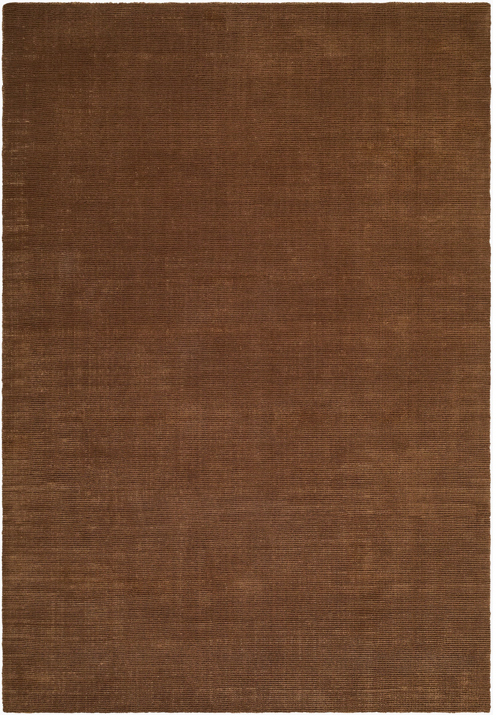 Solid brown handwoven P.E.T fiber rug with fine ribbed texture, available in multiple sizes.