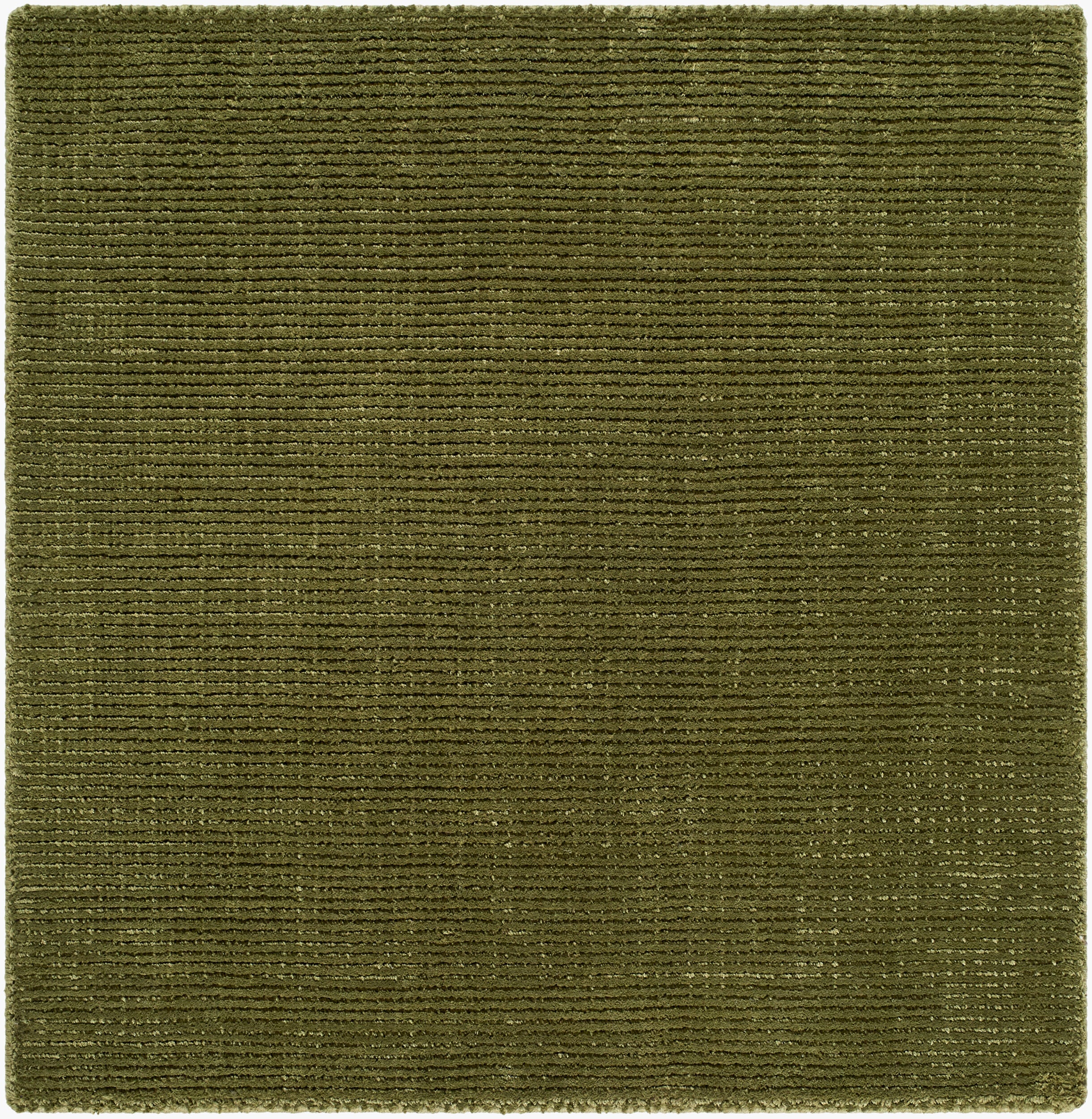 Solid green handwoven P.E.T fiber rug with fine ribbed texture, available in multiple sizes.