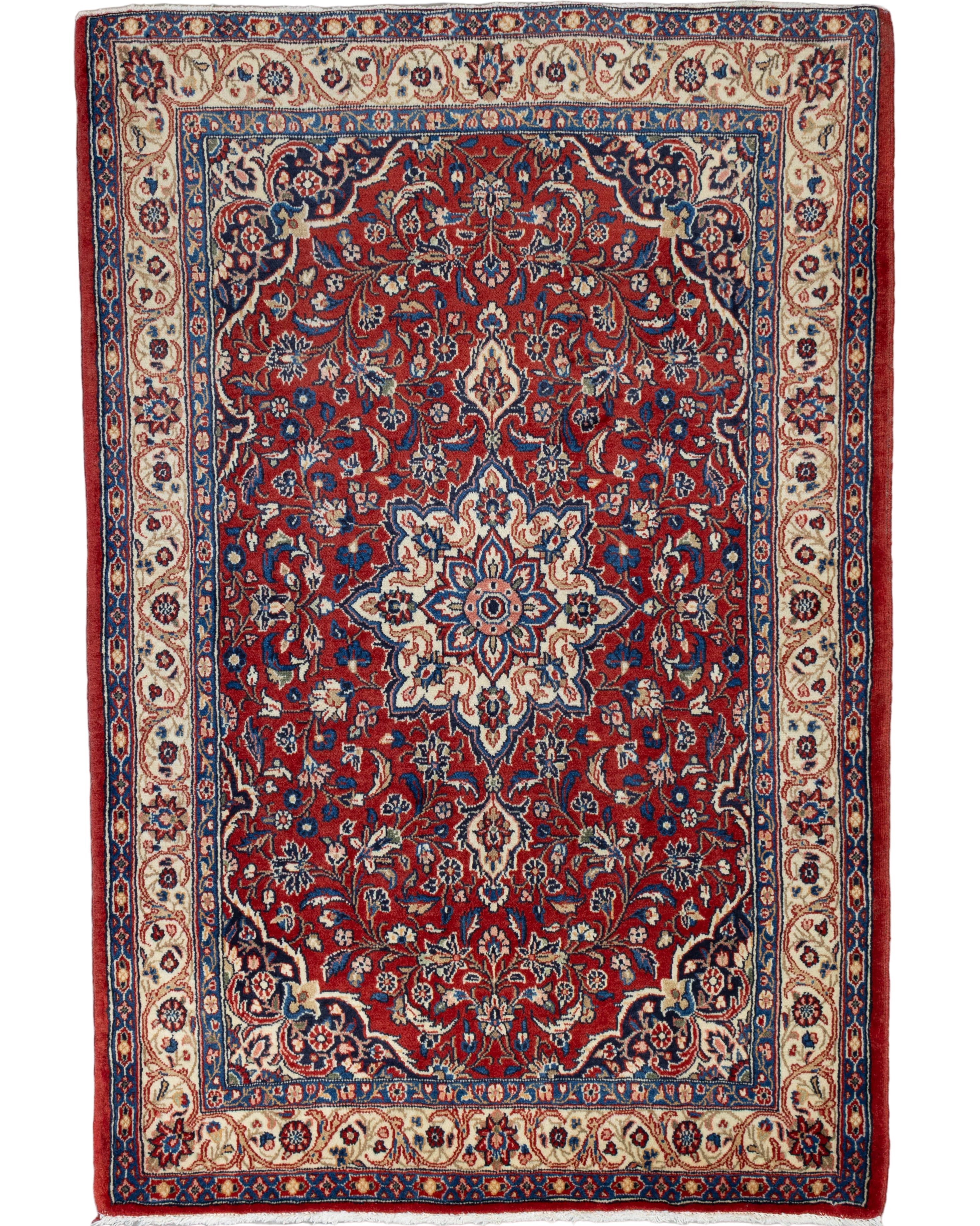 Hand-knotted red and navy wool Persian Sarouk rug with floral star medallion, 3'5" x 5'.