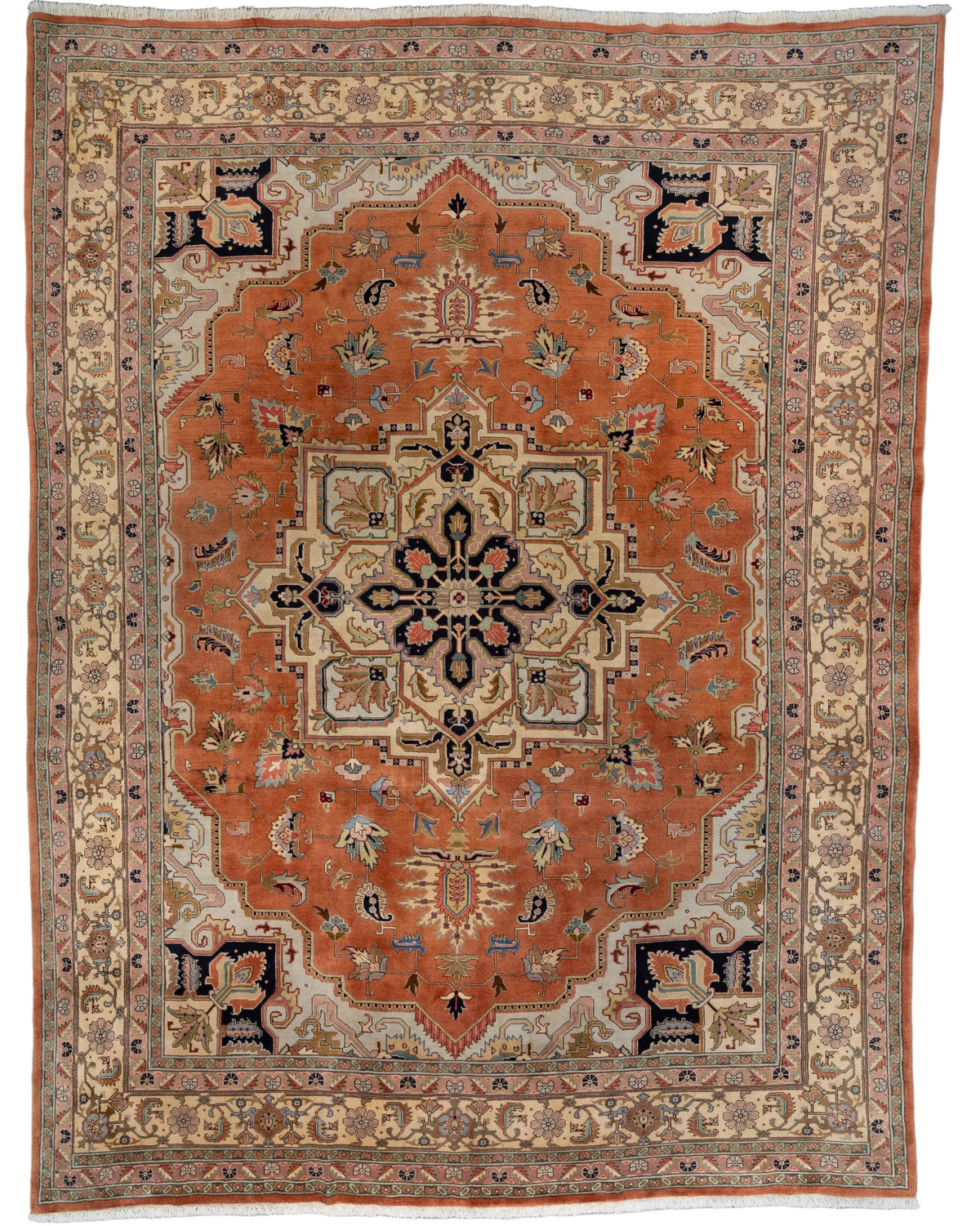 Rust and ivory handknotted wool Persian Heriz rug with a navy and coral star medallion pattern, 9'5" x 12'4".