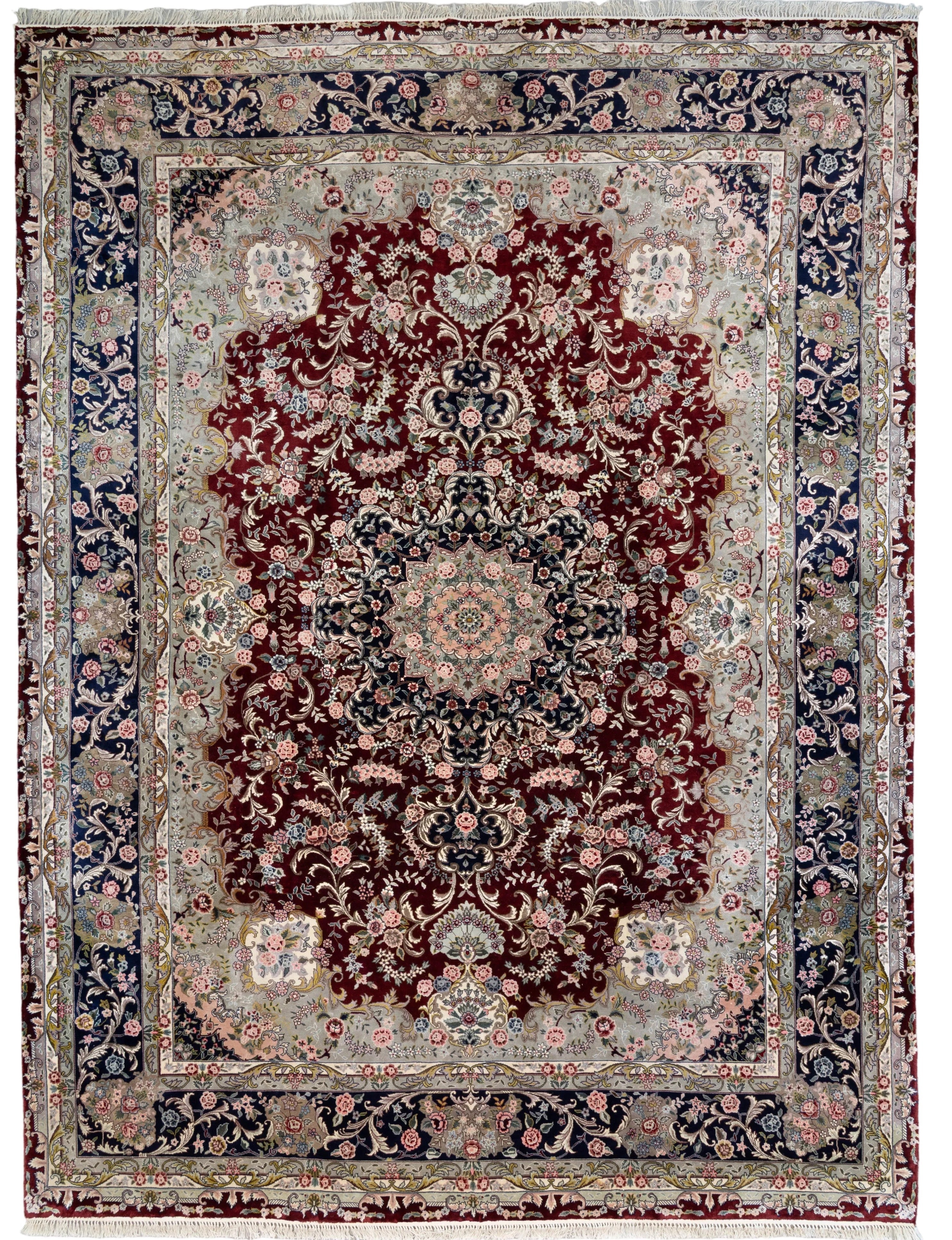 Burgundy and navy handknotted art silk Sino Tabriz rug with a center medallion floral pattern, 9' x 12'.