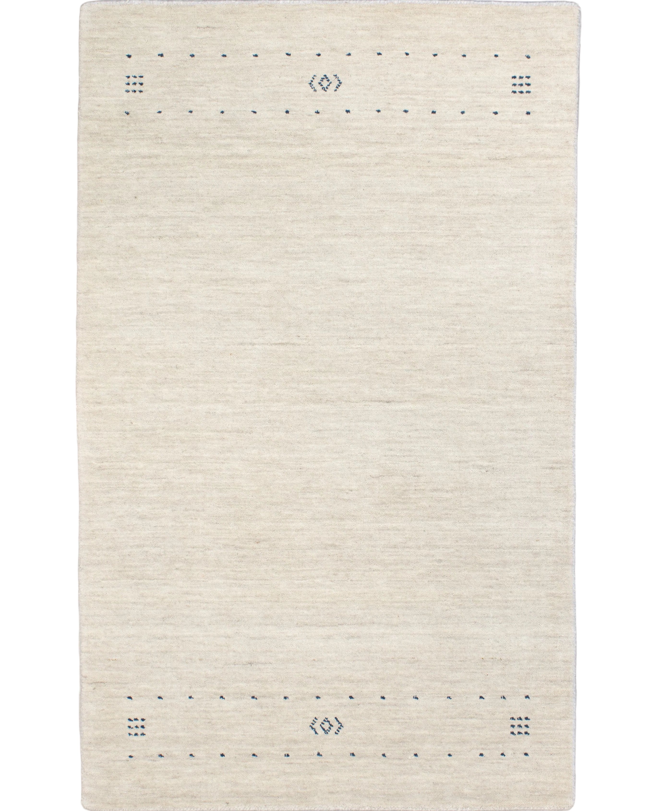 Hand-knotted cream wool Gabbeh-design rug with an open ivory field and delicate indigo dot cluster and diamond border columns, 3' x 5', made in India.