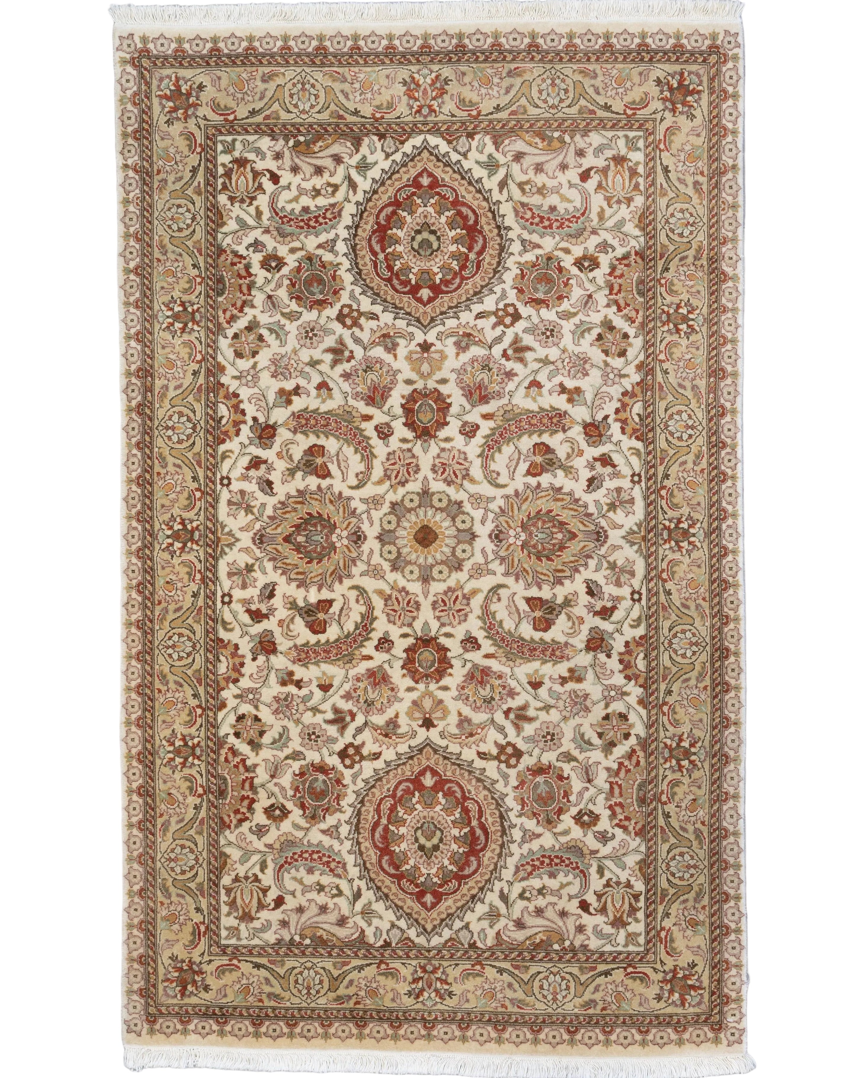 Hand-knotted ivory wool Tabriz-style rug with rust-red floral medallion pattern, 3' x 5'.
