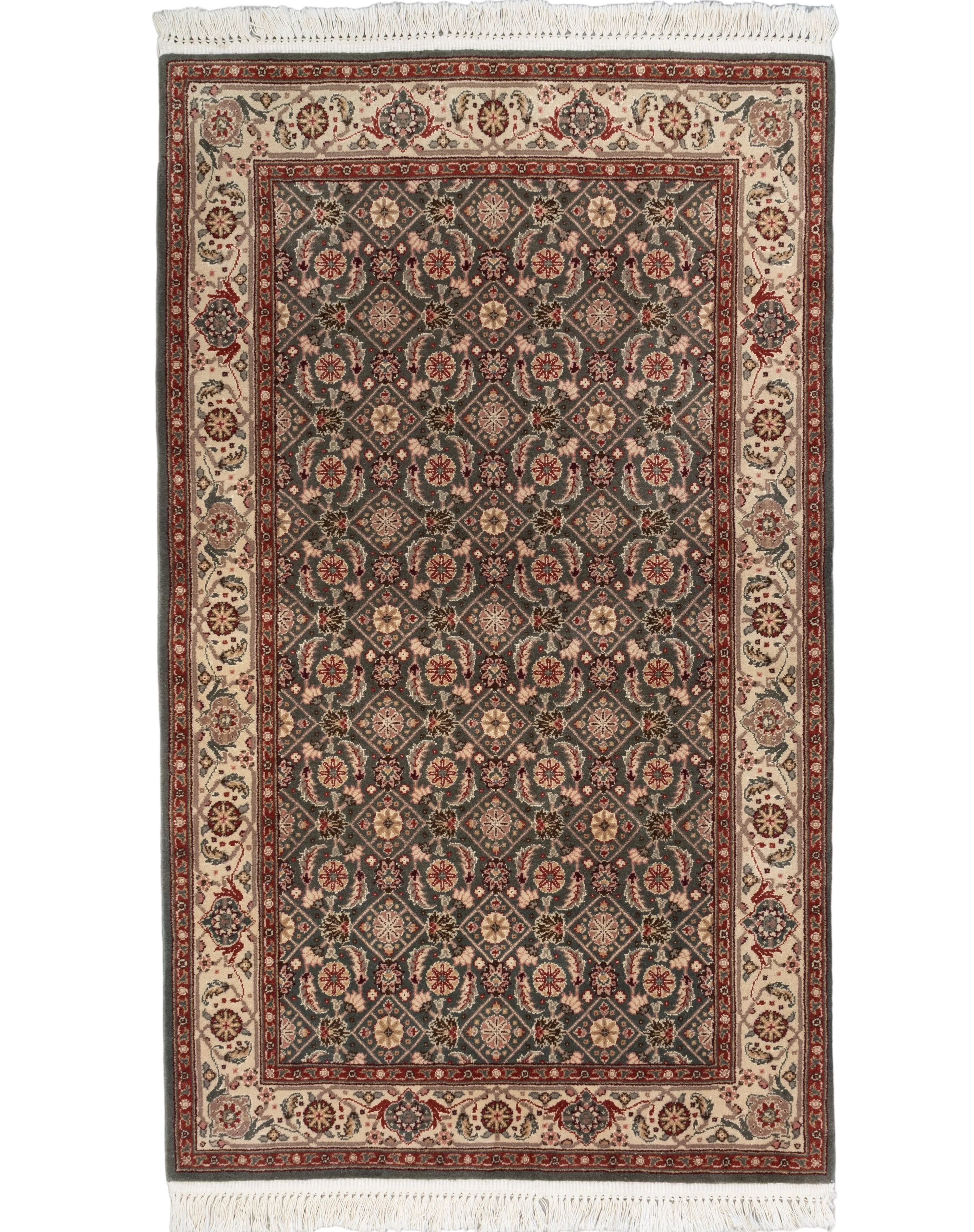 Hand-knotted wool and silk Sino Tabriz rug in slate green with an all-over diamond lattice filled with floral rosettes and an ivory curvilinear vine border, 3' x 5', made in China.