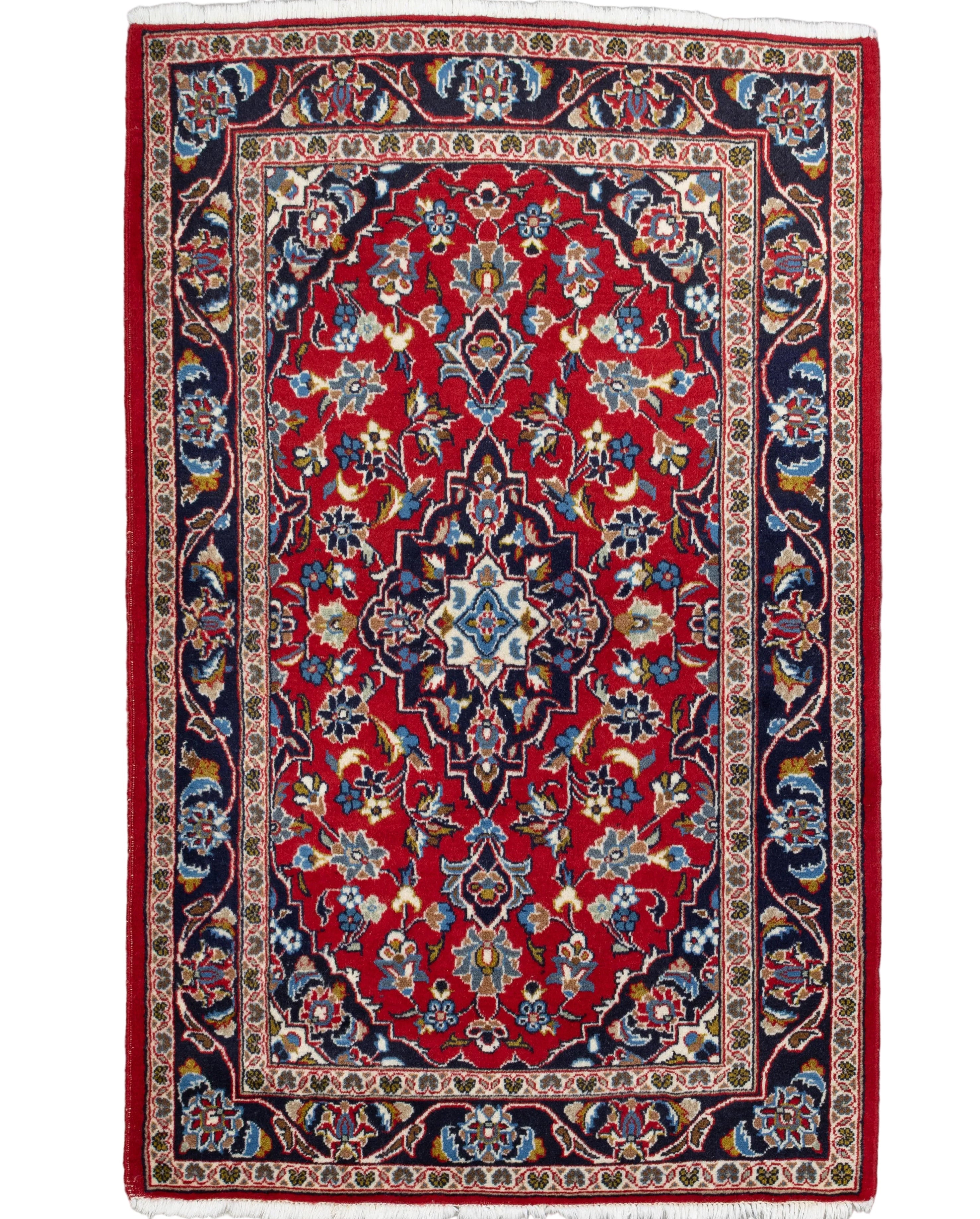 Crimson hand-knotted Persian Mashad wool rug with ivory star medallion and navy border, 3' x 5'.