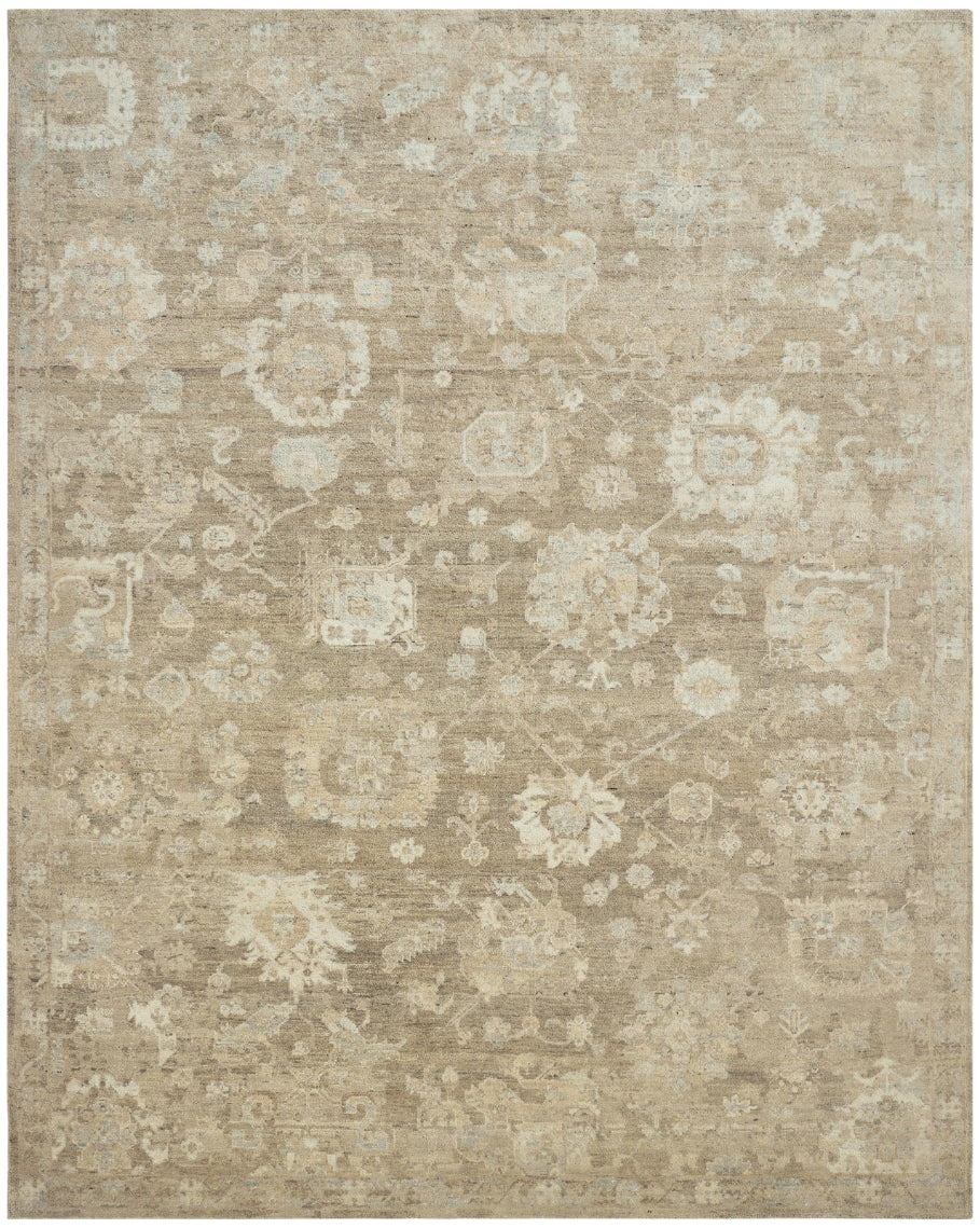 Remus hand-knotted wool area rug in warm taupe and ivory, featuring an all-over traditional botanical and medallion pattern with a washed vintage finish, shown flat against a white background