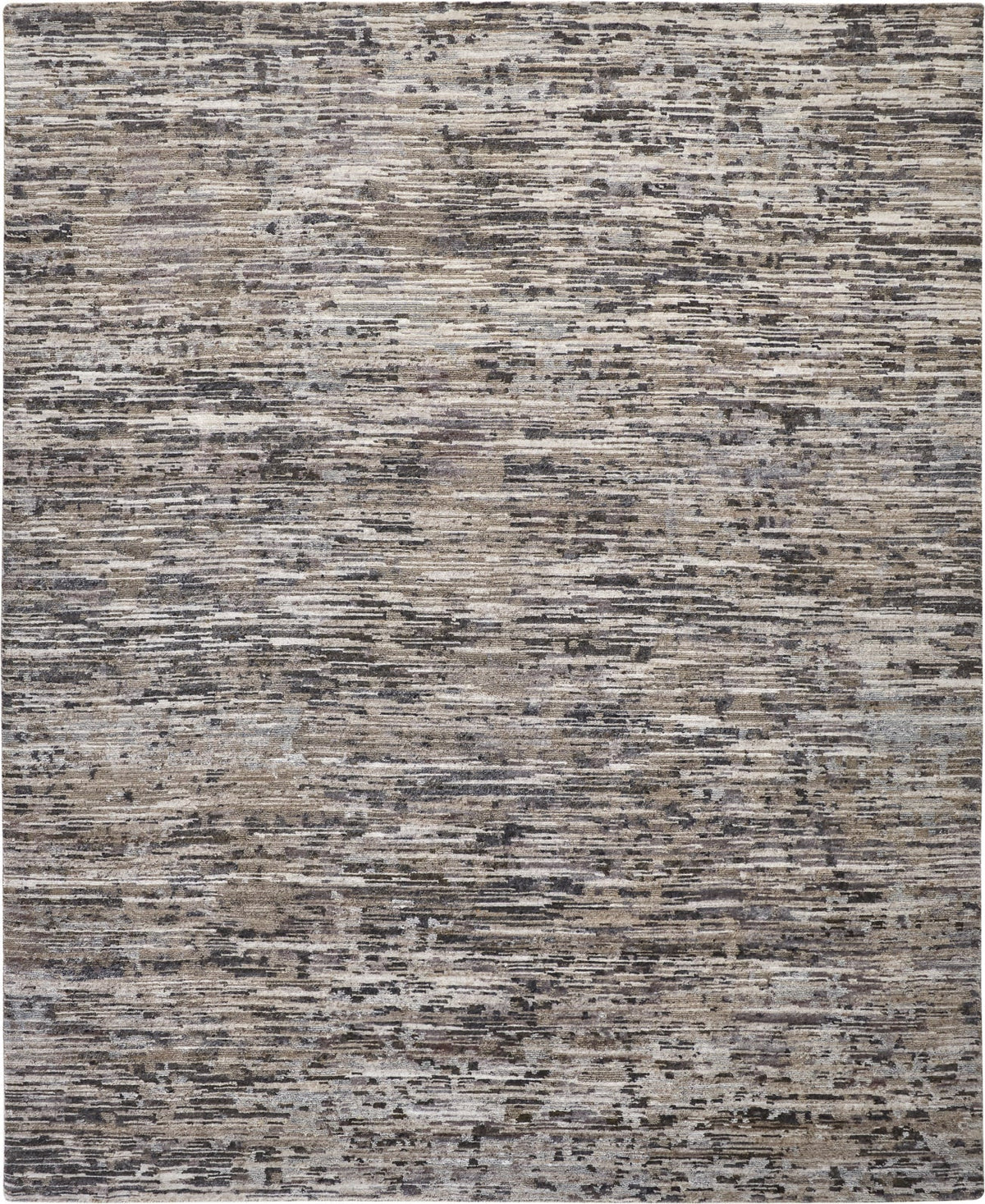 Gray handknotted wool and bamboo silk rug with a striated abstract pattern, shown in a living room setting.
